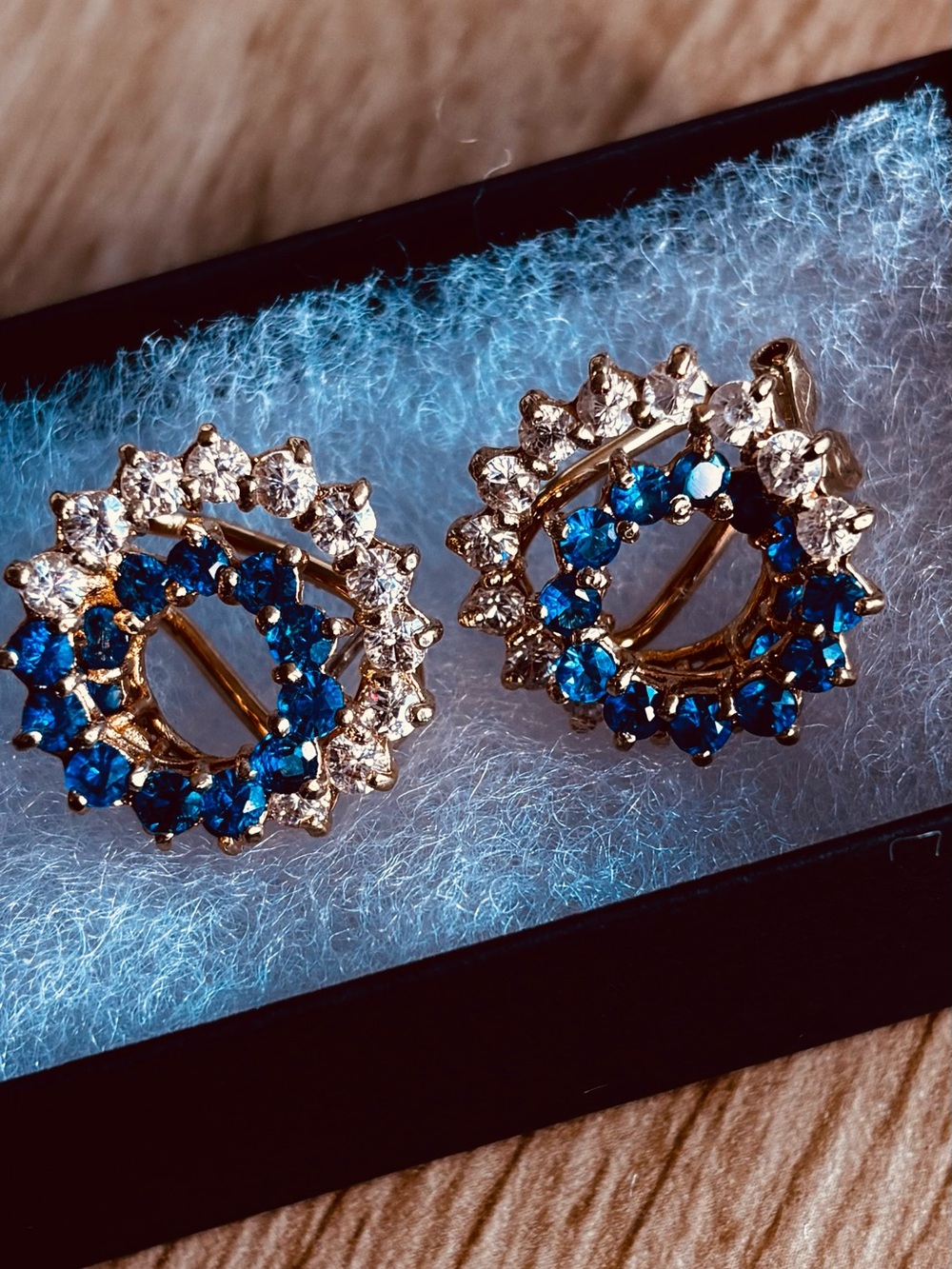 Estate Blue and Clear Spinel Gemstone in a Spiral Channel Setting.